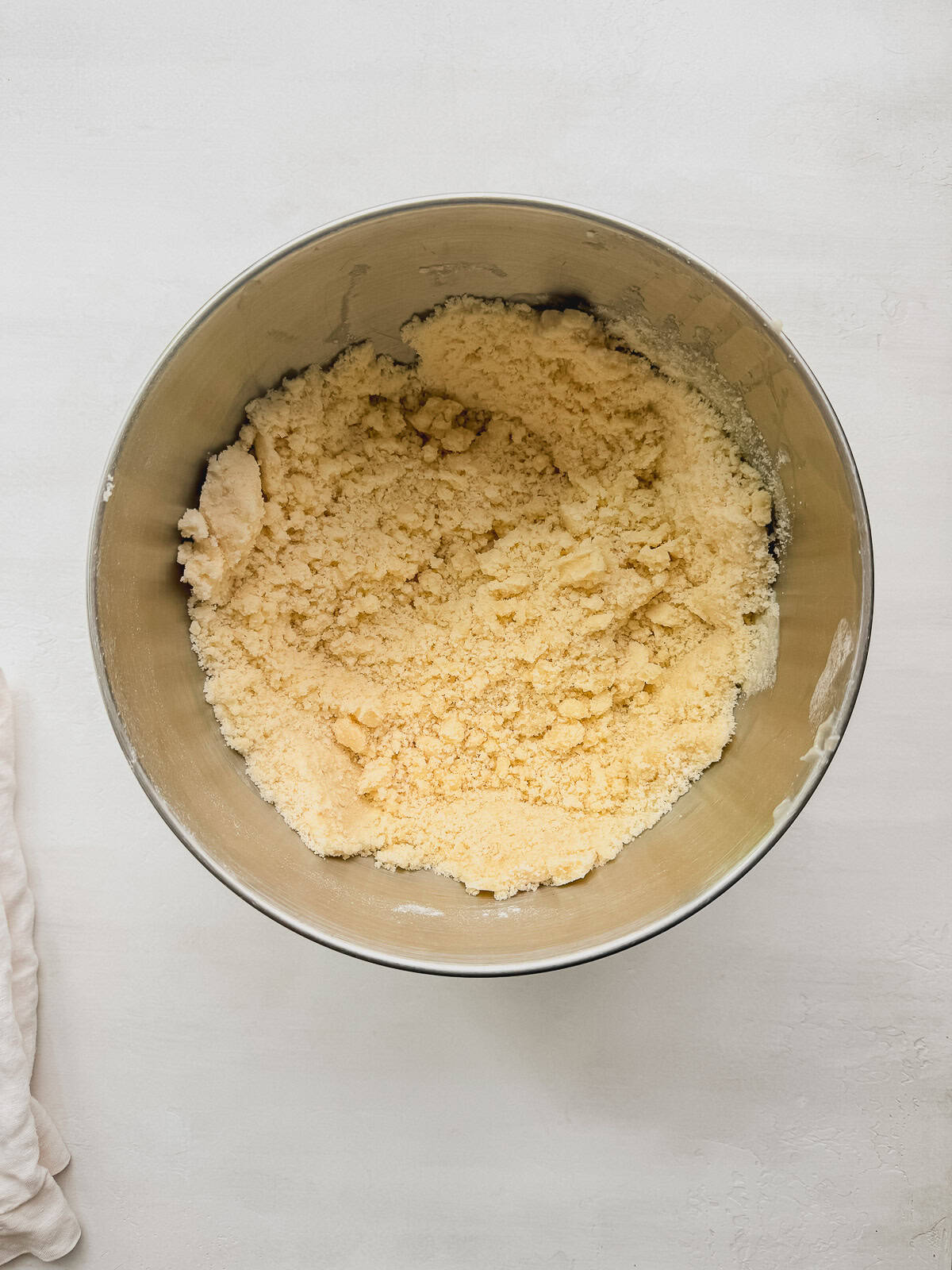Butter and oil added and mixed with the dry ingredients in a bowl.